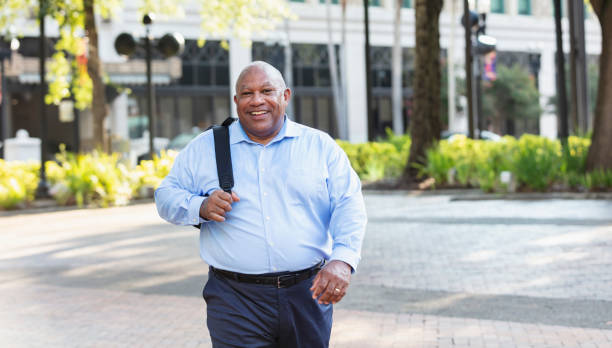 istock Senior black man with large build, in city 1364683883