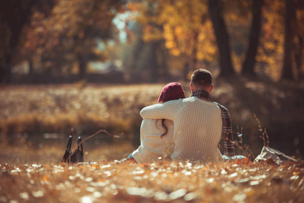 istock Amorous couple spending time in the park 1364685519