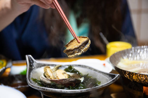 istock Raw Abalone shell fish: traditional Japanese luxury food 1364700054