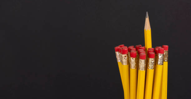 istock A pile of pencils with sharp exceptional leader on large blank space for text message 1364709864