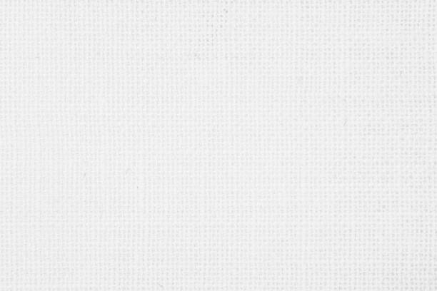 istock White fabric jute hessian sackcloth canvas woven gauze texture pattern in light white color blank. Natural linen and cotton cloth texture as clean background empty for decoration. 1364719823