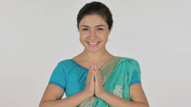istock Indian Showing Namaste Sign by Hands, White Background 1364720022