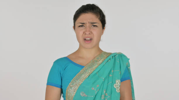istock Indian Woman Disappointed by Results , White Background 1364720054