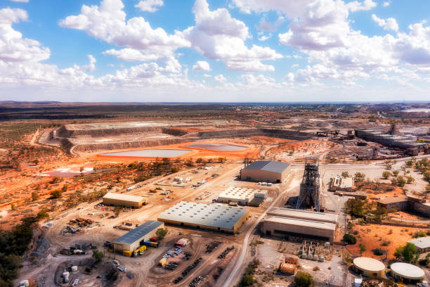 D BH Mines clouds day south east Broken hill mining town in Far West of Australian NSW - aerial townscape over industrial open pit mine. lead mine stock pictures, royalty-free photos & images
