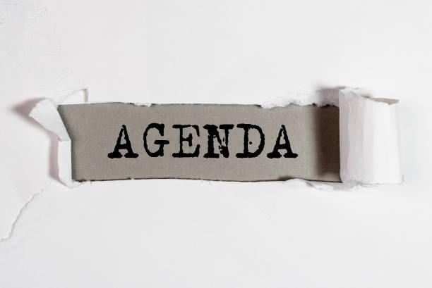 istock Agenda word on white background. Day plans concept 1364724618