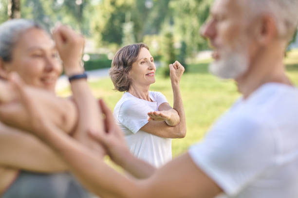 istock Male instructor checking the correctness of the exercise 1364725660
