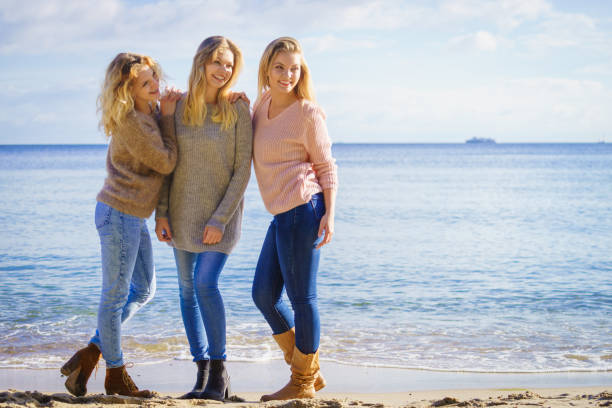 istock Three fashionable models outdoor 1364729866