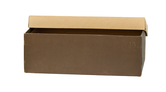 Brown cardboard shoes box with lid for shoe or sneaker product packaging mockup, isolated on white background with clipping path.  Front view.