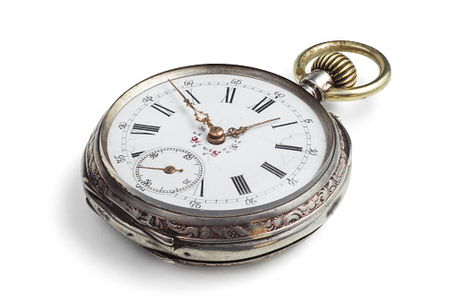 Silver antique pocket watch isolated. Clipping path included