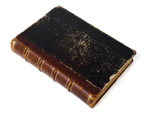 istock Antique book with leather-bound cover on a white background 1364739287