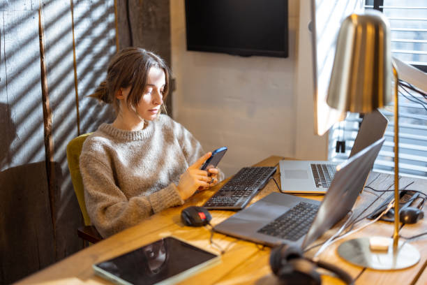 istock Woman works from cozy home office 1364740518