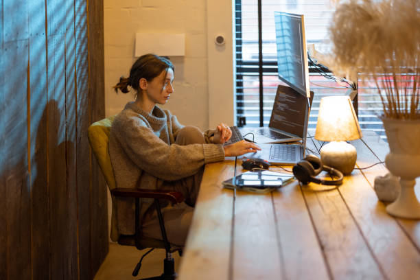 istock Woman works from cozy home office 1364740535