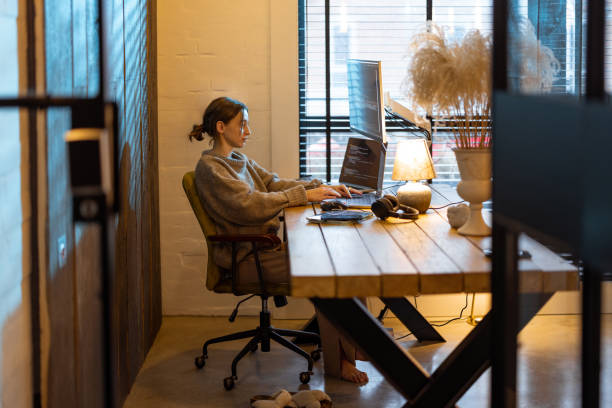 istock Woman works from cozy home office 1364740540