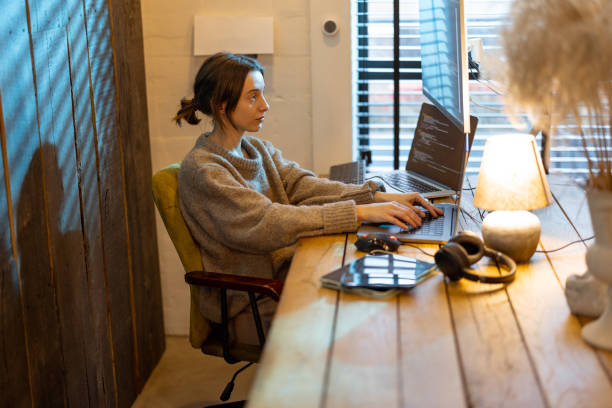 istock Woman works from cozy home office 1364740569