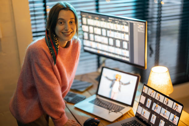 istock Photographer editing photos at home office 1364741270