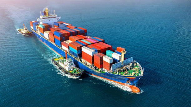 istock Aerial view of cargo ship with cargo container on sea. 1364743614