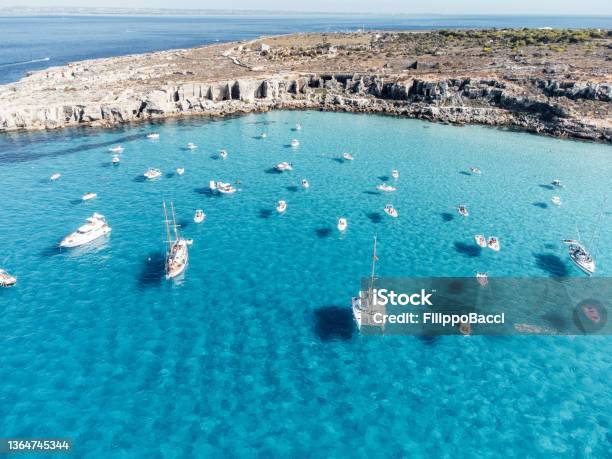 Many Boats Moored In Cala Rossa One Favignana Islands Beach Stock Photo - Download Image Now