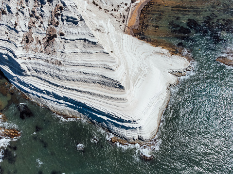 Aerial view of Scala dei Turchi, a famous landmark in Sicily, Italy. Scala dei Turchi is a famous rocky cliff in Realmonte, near Agrigento and Porto Empedocle. The cliff has a bright white color.