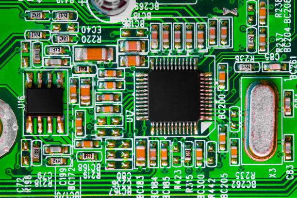 istock Close up of components and microchips on PC circuit board 1364746748