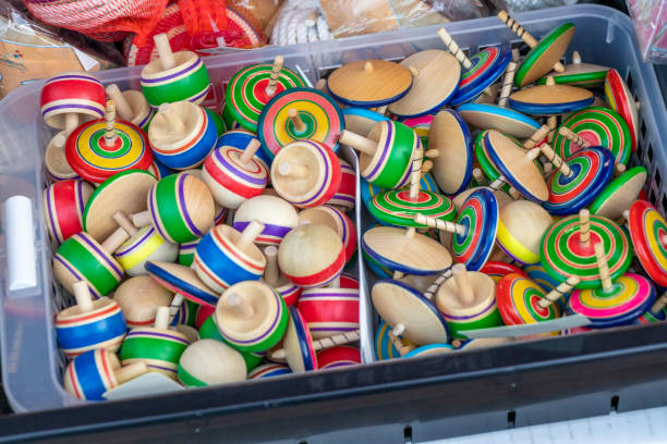 istock Lots of colorful spinning tops 1364751777