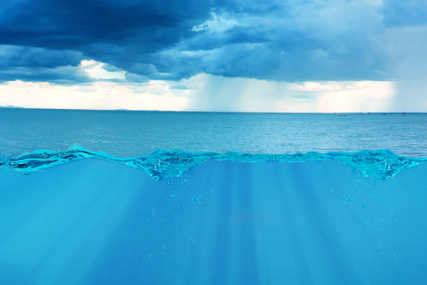 istock Storm over the ocean surface with splash and air bubbles . 1364753723