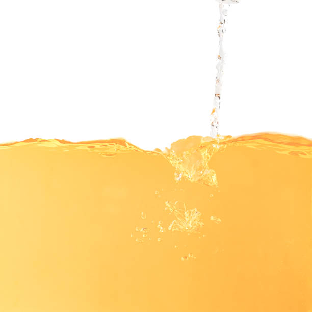 istock Yellow water surface with splash and air bubbles . 1364753786