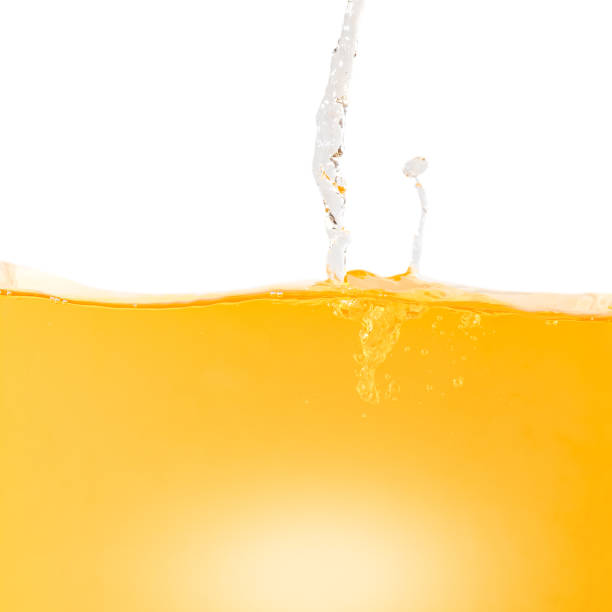 istock Yellow water surface with splash and air bubbles . 1364753788