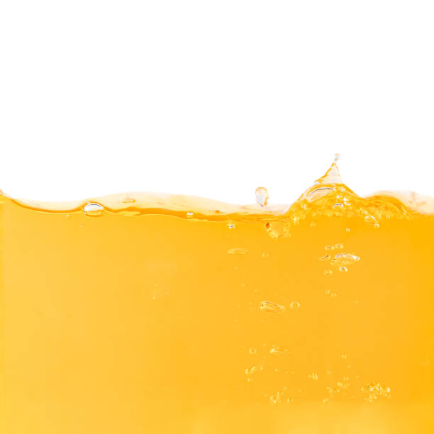 istock Yellow water surface with splash and air bubbles . 1364753789