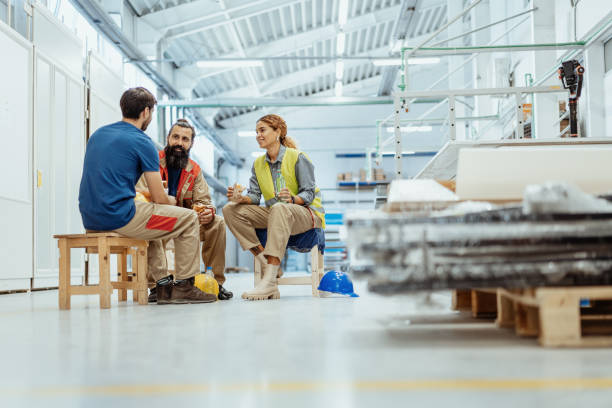 istock Teamwork in industry, employees eating breakfast 1364754108