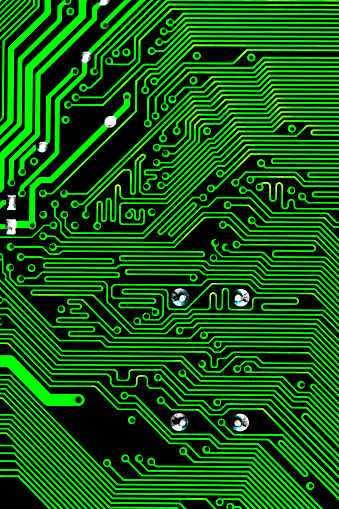 Macro Close up of printed wiring on green PC circuit board