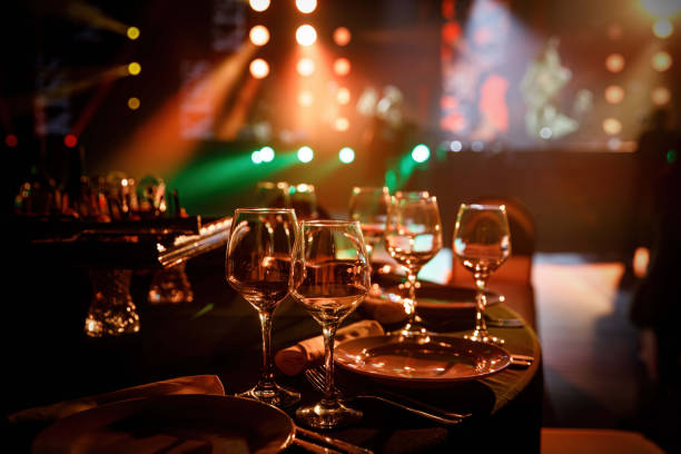 istock Served table in a restaurant at the holiday. Empty glasses before the event 1364759608