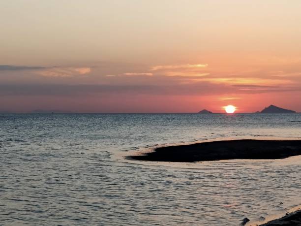 istock Beautiful sunset and orange cloud over the beach in Thailand. 1364760579