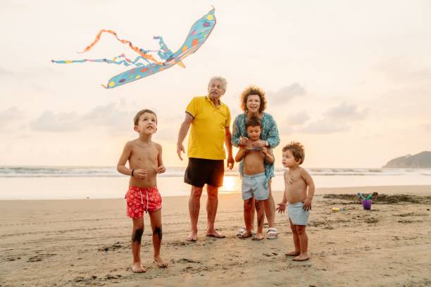 istock Grandfather playing with grandchildren 1364760877