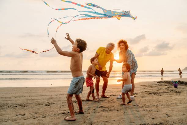 istock Grandfather playing with grandchildren 1364761570