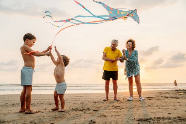 istock Grandfather playing with grandchildren 1364761573