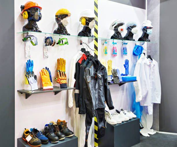 work protective clothing for industry in store - textile textile industry warehouse store imagens e fotografias de stock