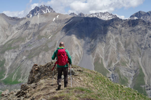 istock Hiker on top of mountain 1364769289