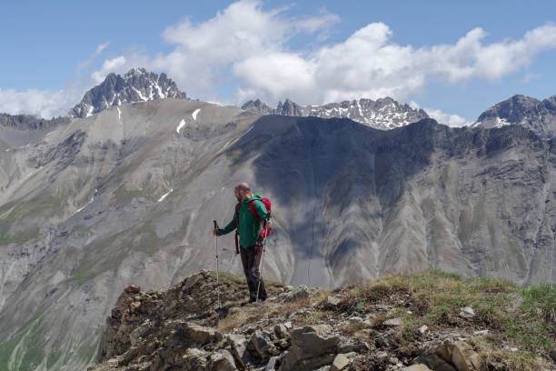 istock Hiker on top of mountain 1364769294