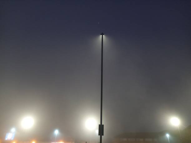 istock Streetlight in fog night 1364769567