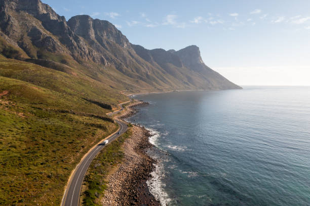 istock Refrigerator truck driving along a coastal road 1364770284