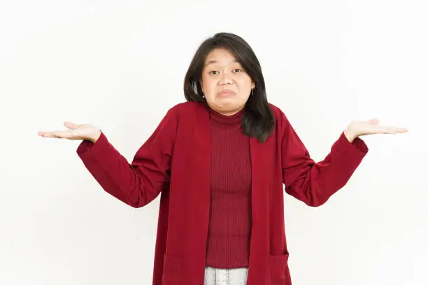 Photo of Doubt Confused Gesture Of Beautiful Asian Woman Wearing Red Shirt Isolated On White Background