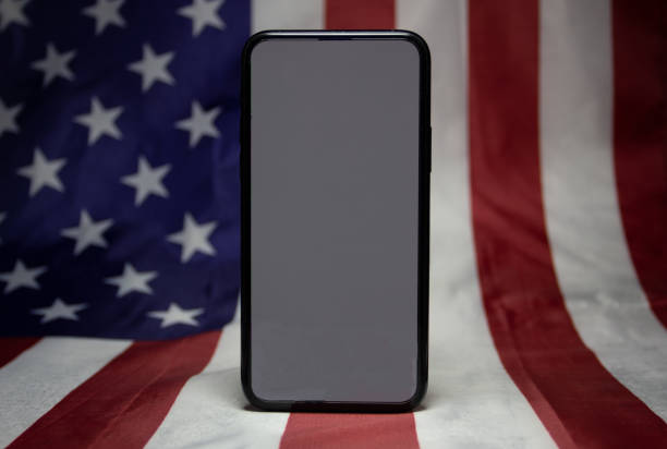 istock black smartphone with white screen. Isolated on white background. 1364773280
