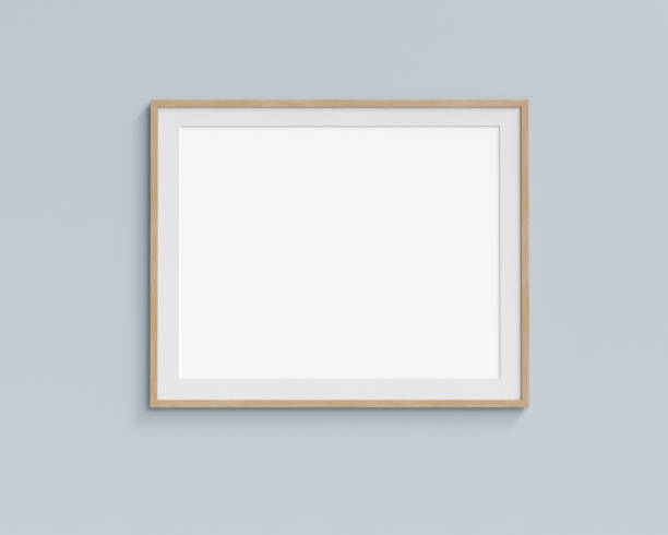 istock Horizontal picture frame mock up hanging on pastel painted wall. 3D render. 1364778299