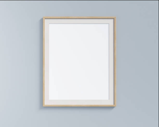 istock Vertical picture frame mock up hanging on pastel painted wall. 3D render. 1364778300