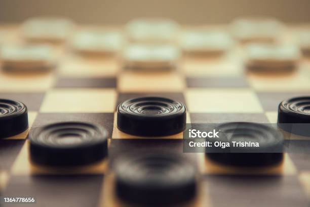 Checkers White And Black On Chessboard Very Close Up Stock Photo - Download Image Now