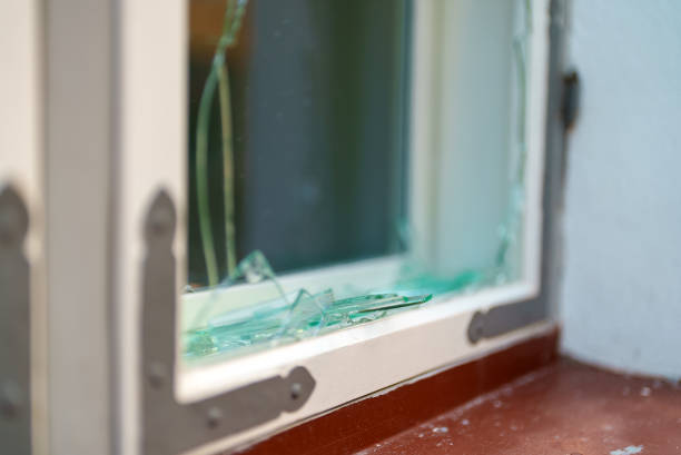 istock Broken window in the house. Vandalism and pogroms. 1364781897