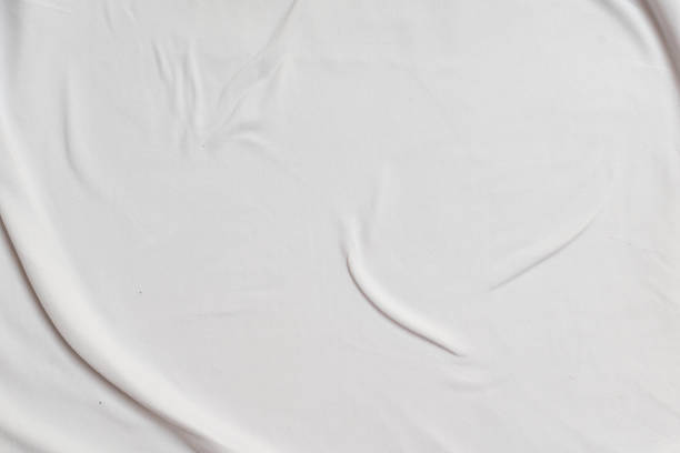 istock Closeup rippled soft white fabric texture background