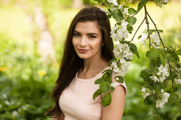 Spring brunette woman outdoor portrait