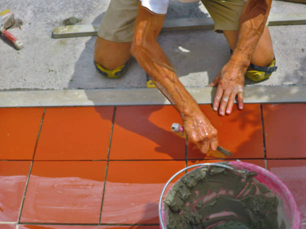 istock worker person at work lays the floor 1364793220