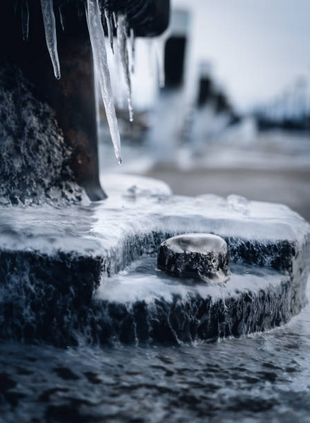 istock Bolt in metal construction covered in ice 1364799742